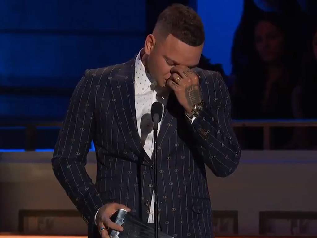 Kane Brown speaking on stage at CMT's 2019 Artists of the Year event  on Wednesday, Oct. 16, 2019.