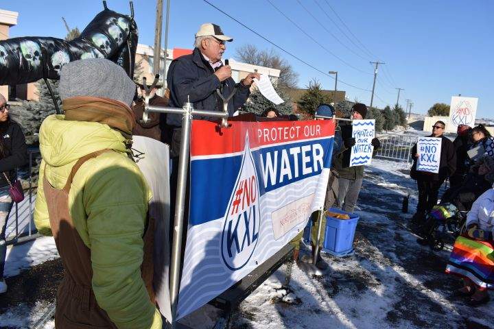 Montana state Sen. Frank Smith expresses his opposition to the Keystone XL oil pipeline from Canada during a demonstration in Billings, Mont. on Tuesday, Oct. 29, 2019. Smith says the 1,200-mile line will eventually break and could threaten water supplies on the Fort Peck Indian Reservation.