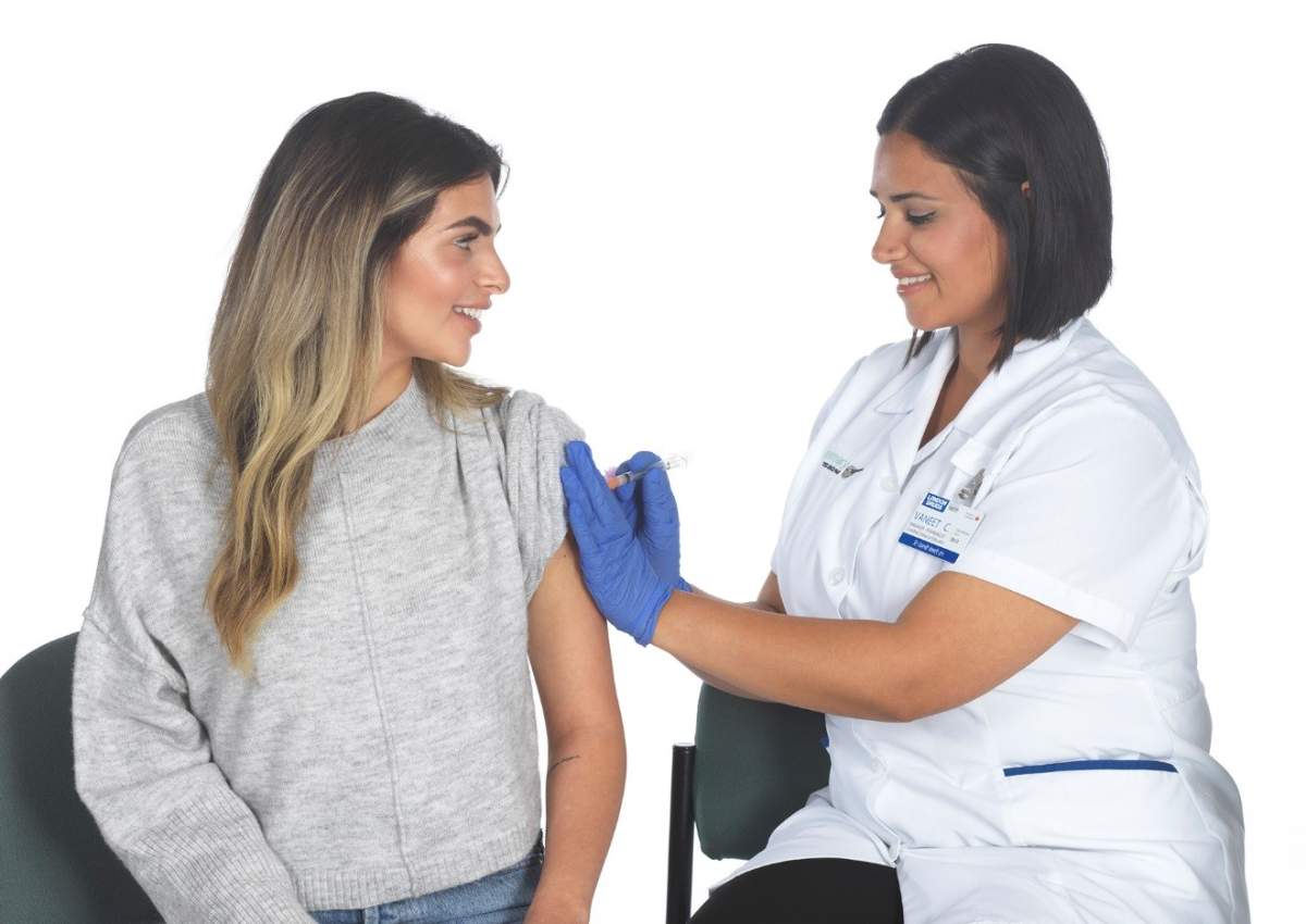 London Drugs pharmacist, Vaneet Chahal, administers a flu shot. London Drugs hopes to increase flu immunization rates this year with increased convenience, vaccination donation campaign and a new ‘ouchless’ flu shot option.
