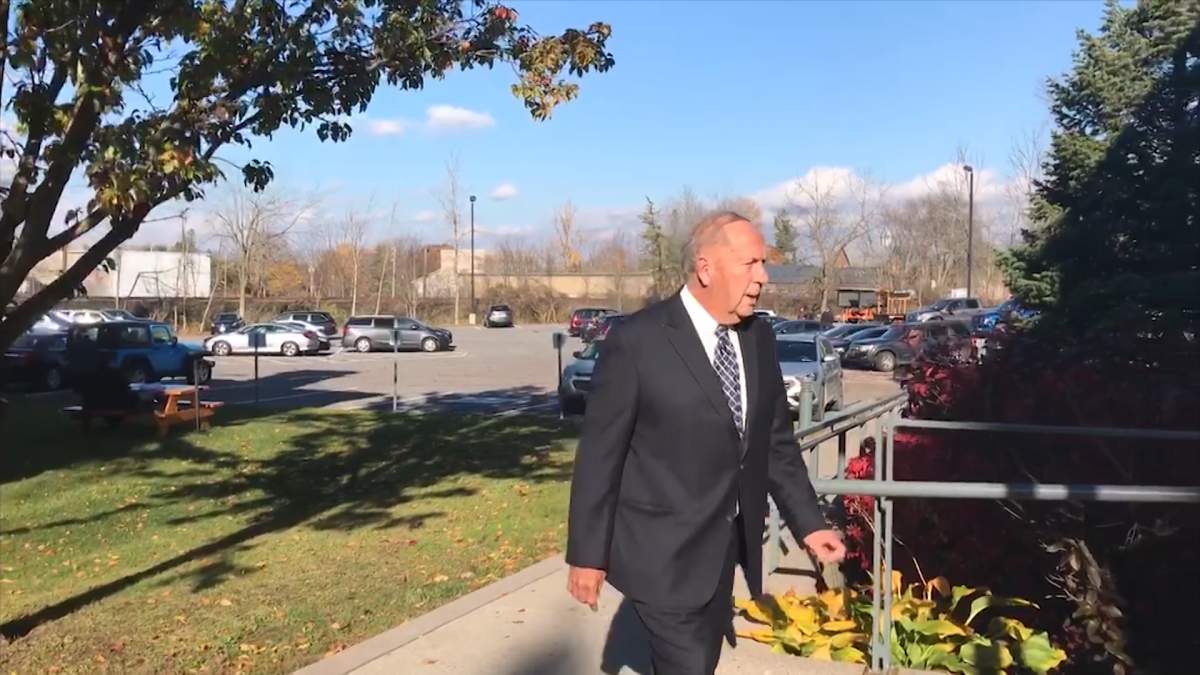 Neil Joynt walks into Napanee's Superior Court for his retrial on Monday. Joynt was originally convicted for historic sexual assaults of two boys in 2016.