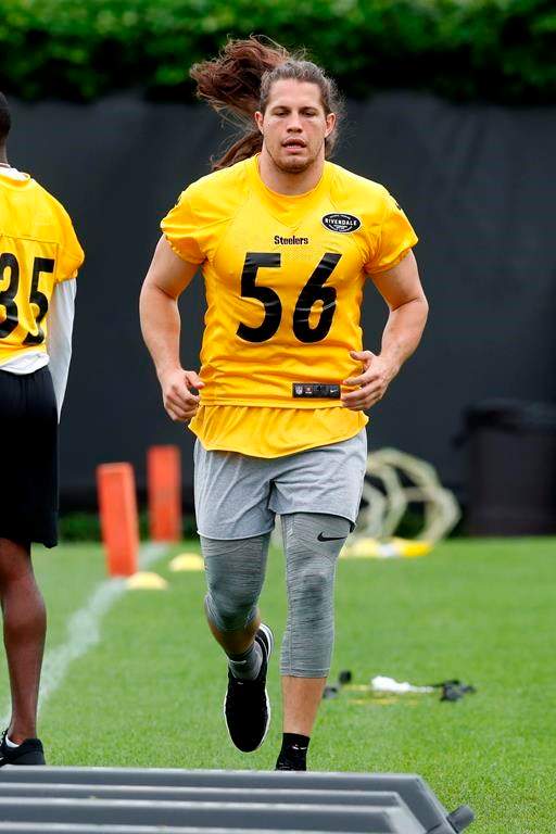 Pittsburgh Steelers’ linebacker Anthony Chickillo runs a drill during an NFL practice in late May. (AP Photo/Keith Srakocic, File)