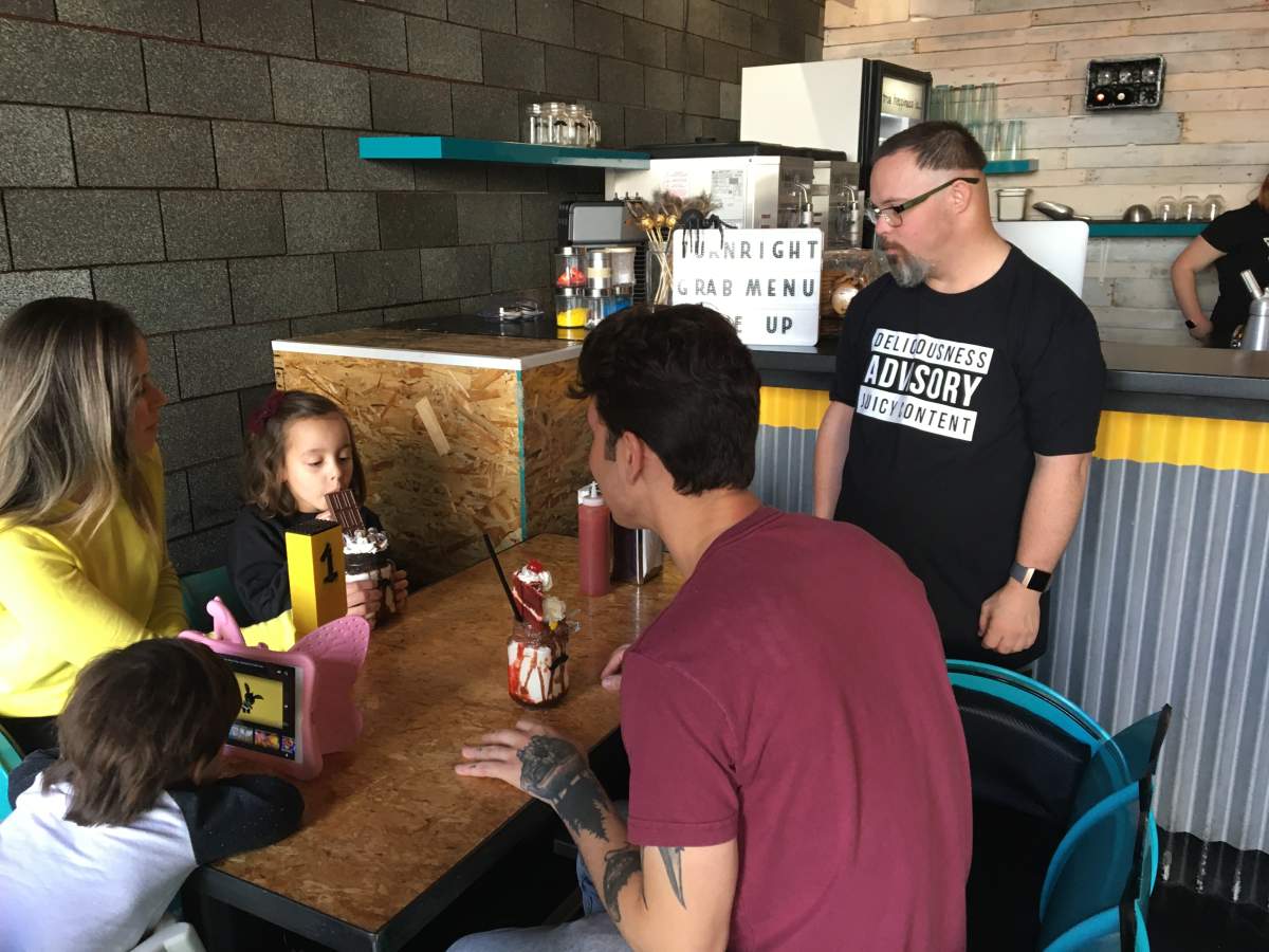 Jason Goebel interacting with customers.