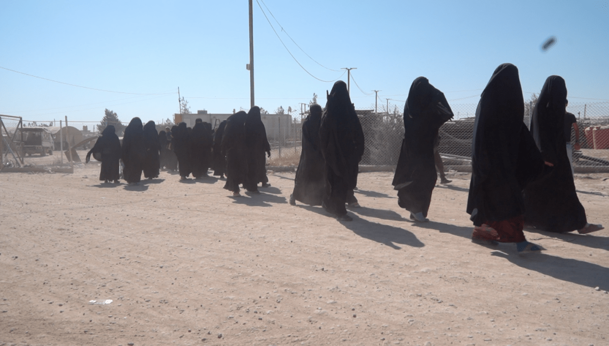 Guards at Al-Hawl camp in northern Syria arrest women accused of gathering to whip a woman for violating their religious code.