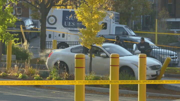 Investigators at the scene of the police-involved shooting in North York Saturday.
