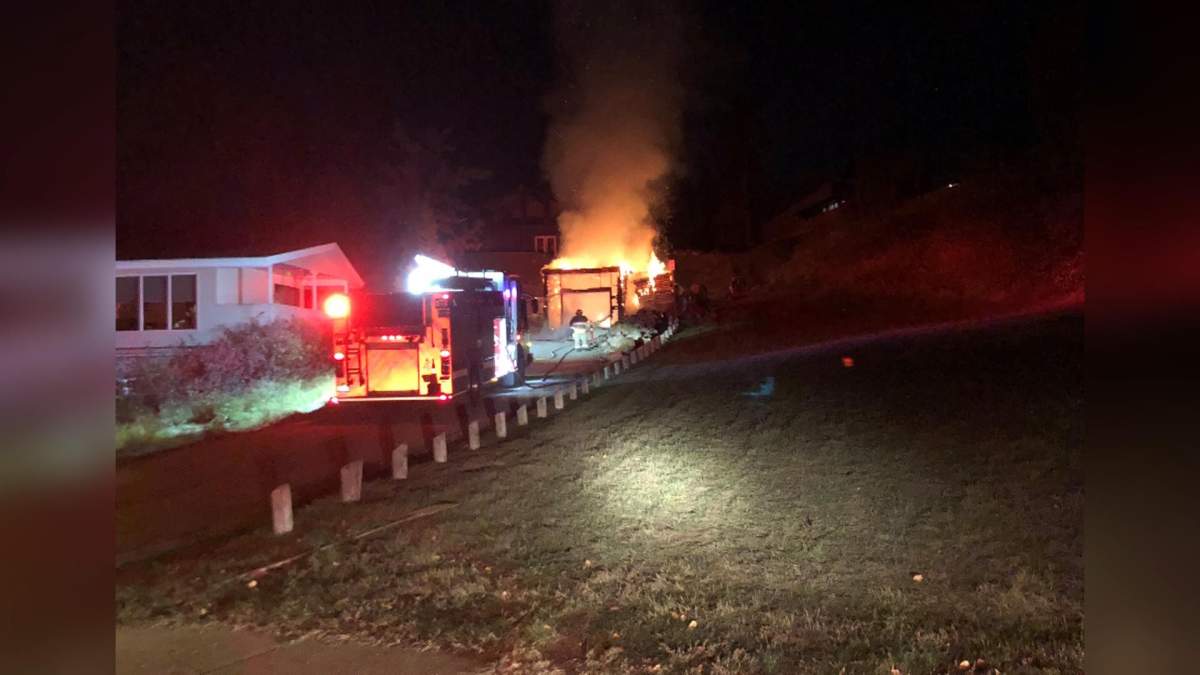 Saskatoon Fire Department battles a garage fire on Saturday night in Saskatoon.