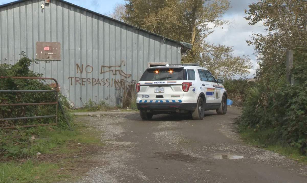 RCMP outside a property in Surrey, which was raided on Oct. 5, 2019 over allegations of a possible cockfighting operation.