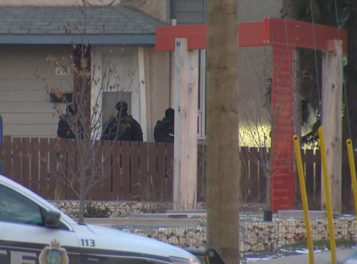 Winnipeg police at the scene of a home on Pacific Avenue on Thursday, Oct. 31, 2019.