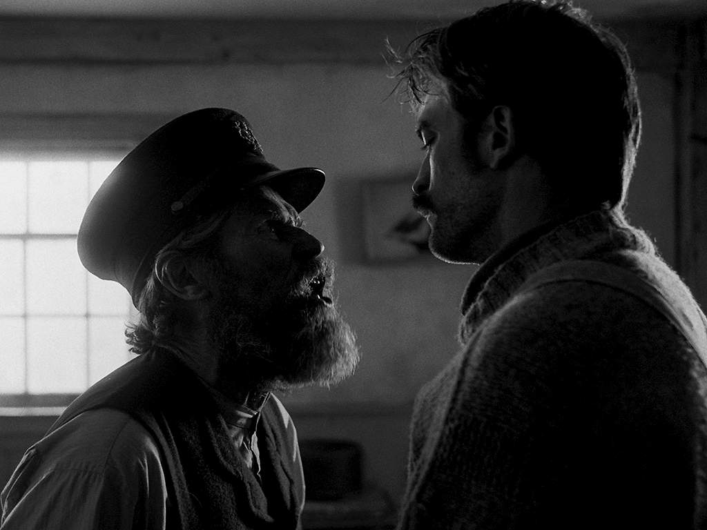 Williem Dafoe and Robert Pattinson in 'The Lighthouse.'.