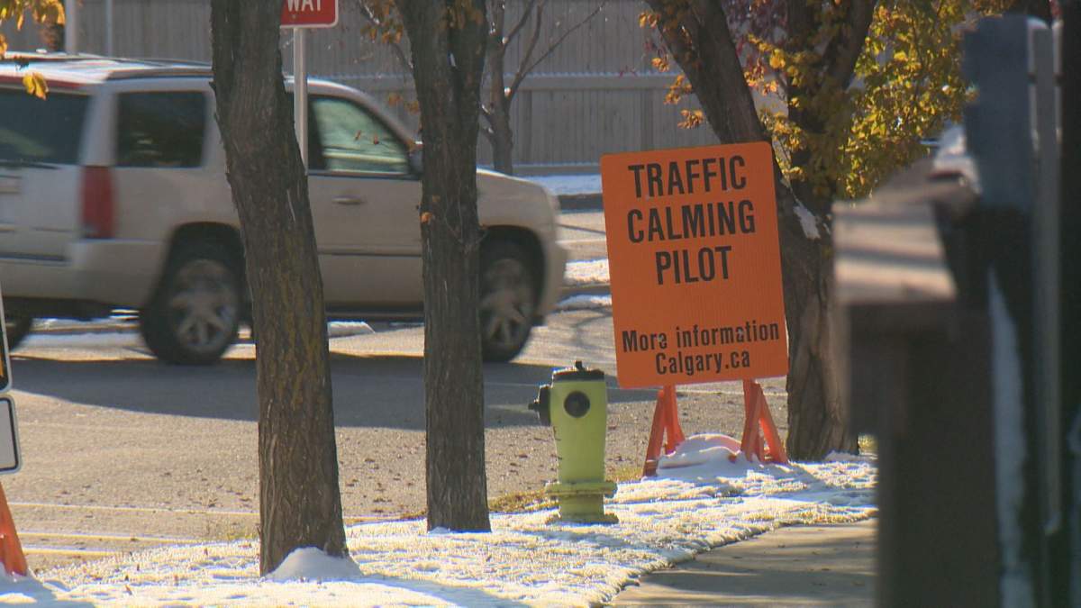 The traffic calming pilot project has narrowed Country Hills Drive from four lanes to two.