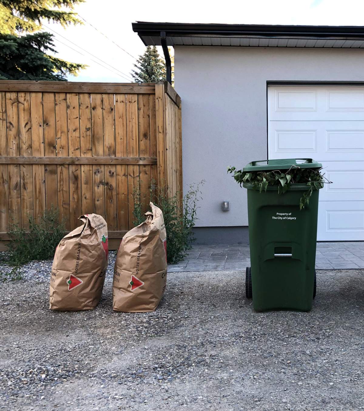 The City of Calgary is reminding Calgarians to make sure their green carts and extra bags aren’t too heavy.