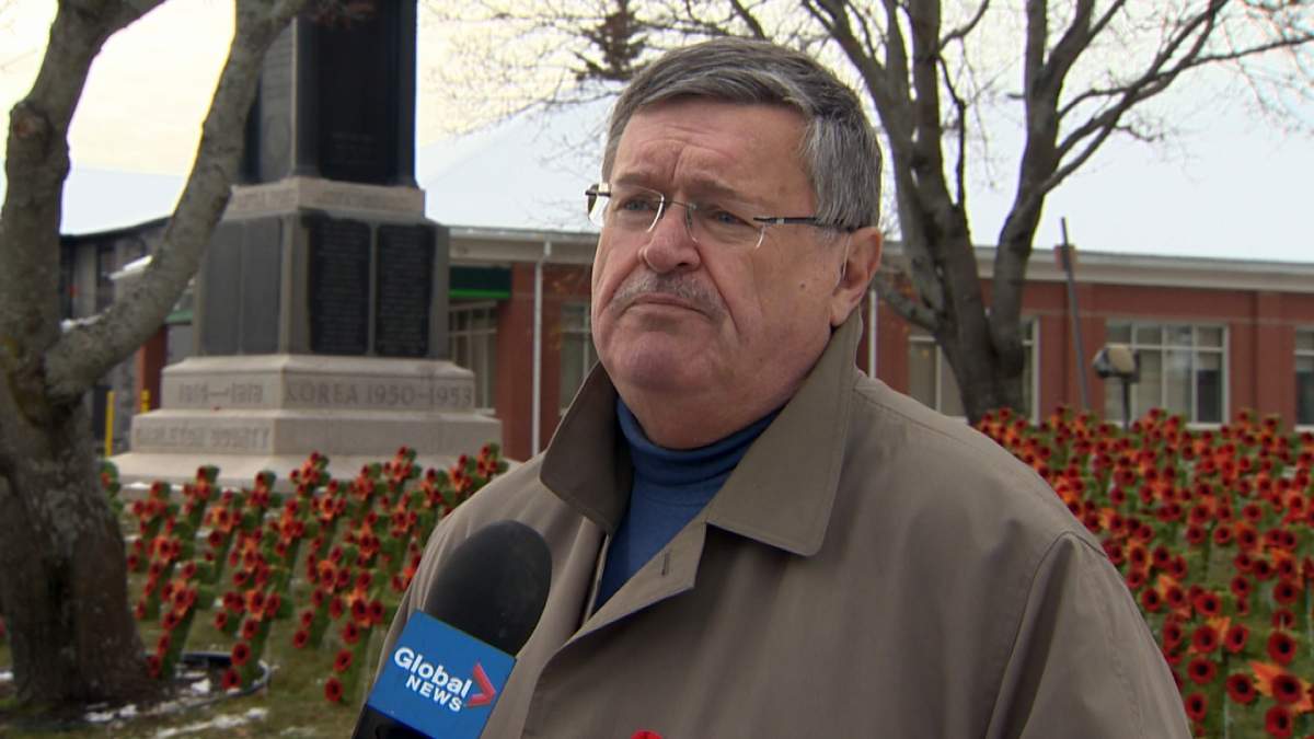Former Woodstock mayor Randy Leonard is behind the banners through town.
