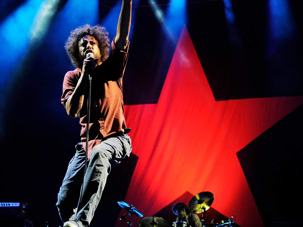 Zack de la Rocha of Rage Against the Machine performs during the band's headlining set at the 'L.A. Rising' concert at the Los Angeles Coliseum, Saturday, July 30, 2011, in Los Angeles, Calif.