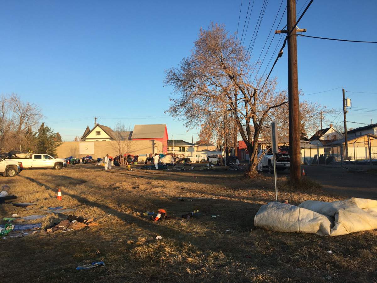 A homeless encampment in central Edmonton being taken down on Friday, Nov. 1, 2019.
