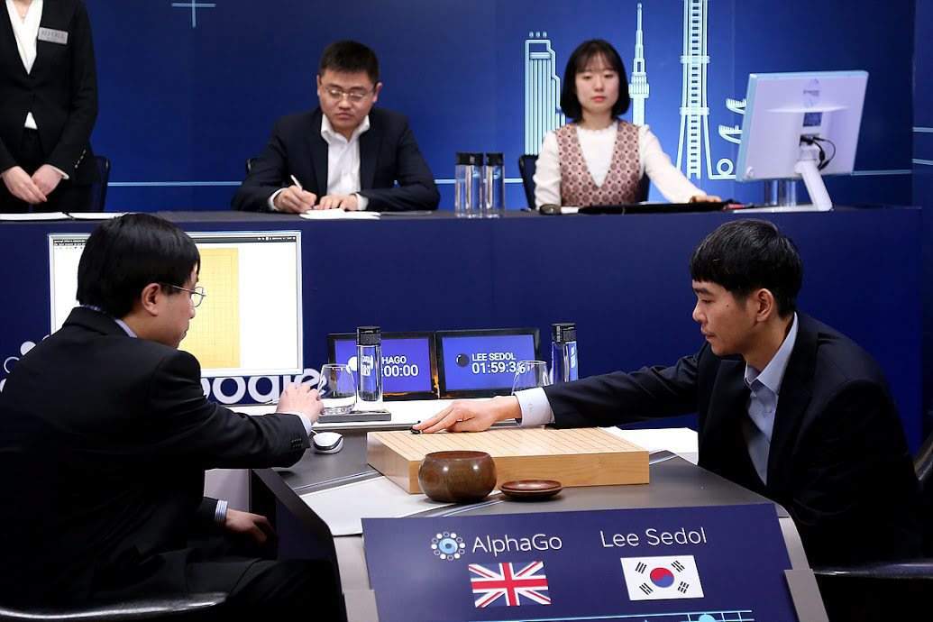A handout photo provided by Google shows South Korean Go grandmaster Lee Se-dol (R) making the first move in the final match of the landmark, five-game showdown between Lee and the Google-developed artificial intelligence system AlphaGo at the Four Seasons hotel in central Seoul, South Korea, 15 March 2016.