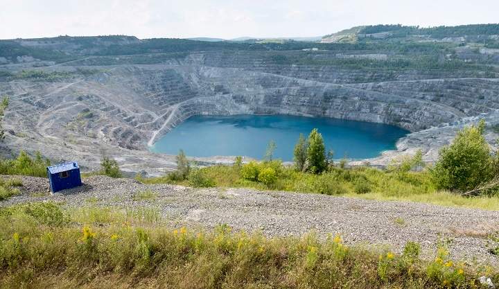 The open pit of the now closed Jeffrey mine is seen Wednesday, August 10, 2016 in Asbestos, Que. 