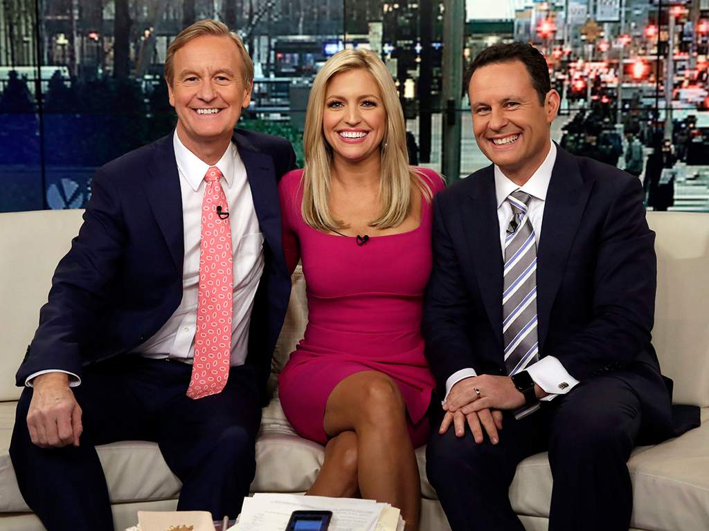 In this Feb. 29, 2016 file photo, co-hosts Steve Doocy, from left, Ainsley Earhardt and Brian Kilmeade appear on the morning show ‘Fox & Friends’ in New York City.