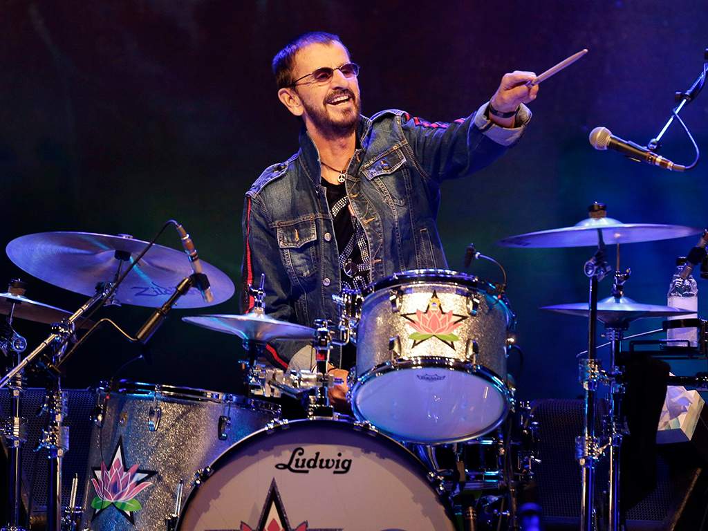 Ringo Starr plays as part of a concert celebrating the 50th anniversary of Woodstock in Bethel, N.Y., on Friday, Aug. 16, 2019.