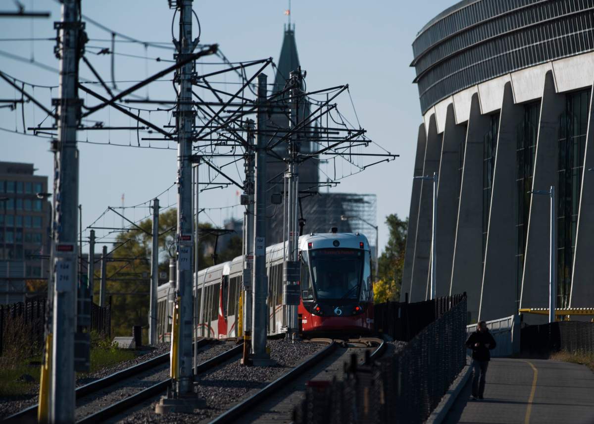 An LRT train on OC Transpo's new O-Train Confederation Line heads towards Lees Station in Ottawa on Friday, Oct. 11, 2019.