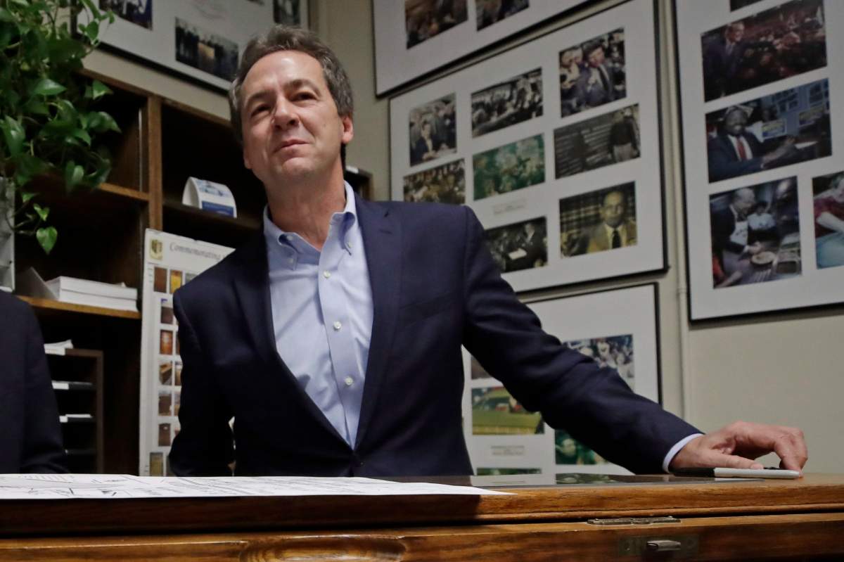 Democratic presidential candidate Montana Gov. Steve Bullock speaks to media after filing to be placed on the New Hampshire primary ballot at the Statehouse, Tuesday, Nov. 12, 2019, in Concord, N.H.