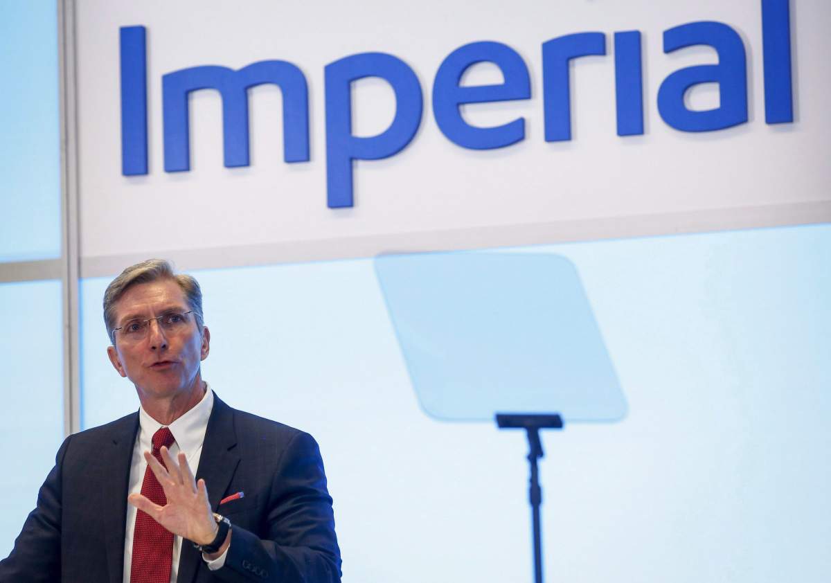 Rich Kruger, president and CEO of Imperial Oil, addresses the company's annual meeting in Calgary, Friday, April 29, 2016. The outgoing CEO of Imperial Oil Ltd. says the $2.6-billion Aspen oilsands project in northern Alberta it announced a year ago — only to cancel it a few months later — will remain on the sidelines until the province completely ends its oil curtailment plan. 