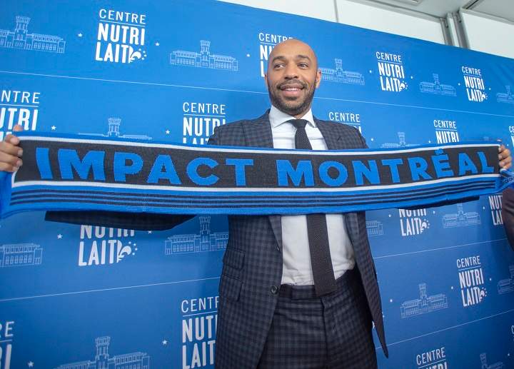 Montreal Impact new head coach Thierry Henry poses for photos after a news conference Monday, November 18, 2019 in Montreal. 