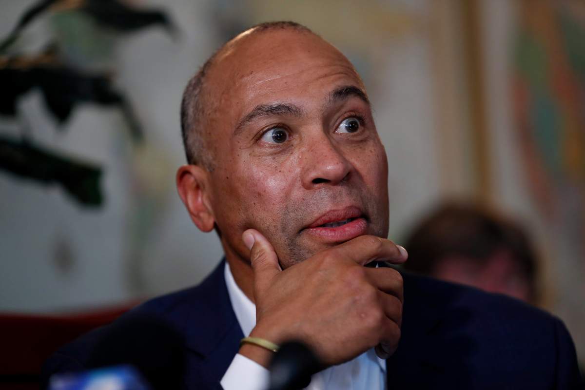Democratic presidential candidate former Massachusetts Gov. Deval Patrick speaks to local residents during a stop at the Sykora Bakery, Monday, Nov. 18, 2019, in Cedar Rapids, Iowa.