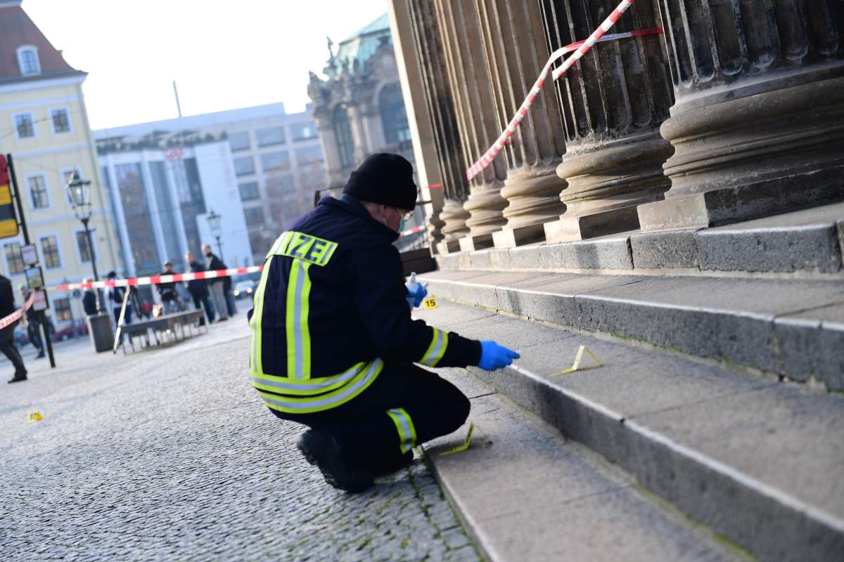 Police officer investigates at the Dresden in Dresden, Saxony, Germany, 25 November 2019. Dresden’s Treasury Green Vault was broken into on early 25 November. (EPA/FILIP SINGER)