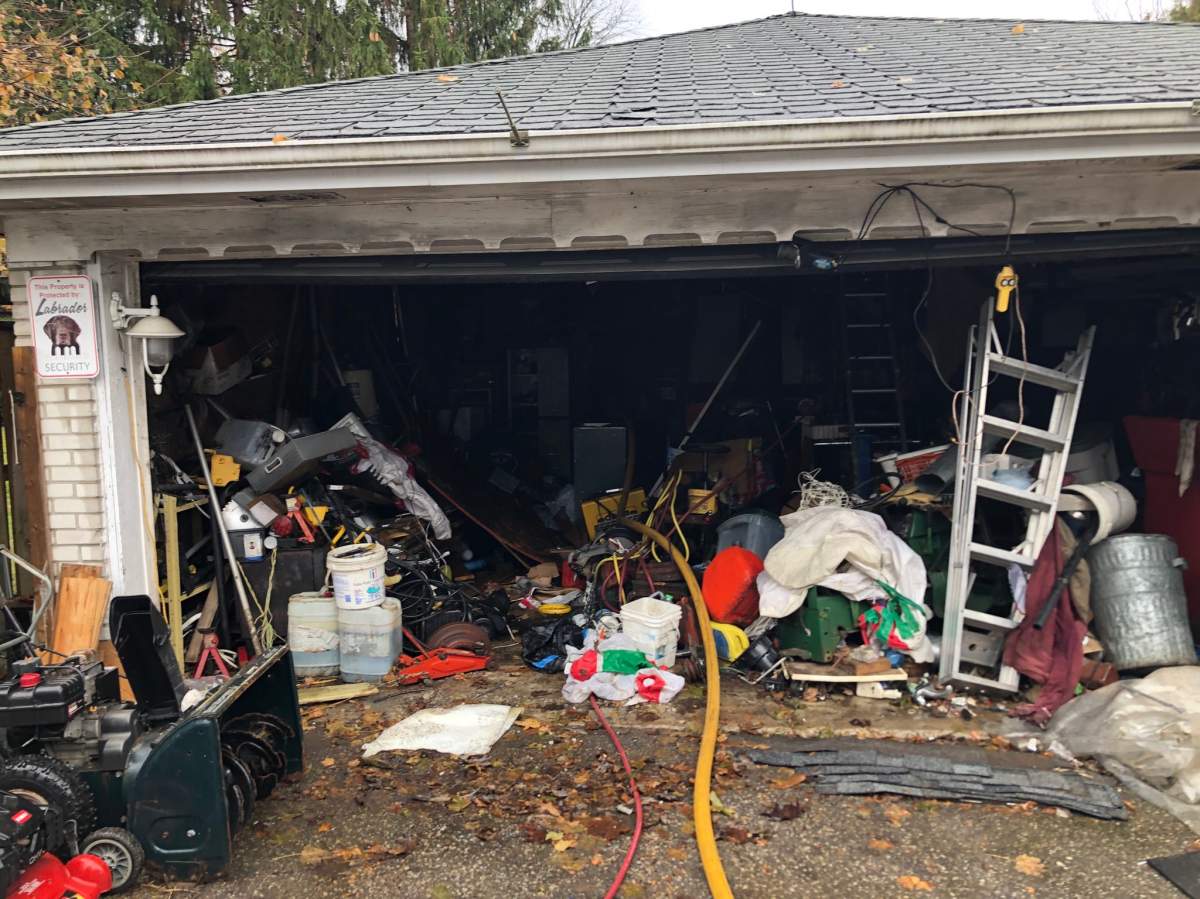 Fire damage to a detached garage at a home on McNay Street in London, Ont., Nov. 27, 2019.
