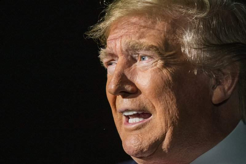 President Donald Trump speaks to reporters as he leaves the White House in Washington for a trip to New York City, Saturday, Nov. 2, 2019. 