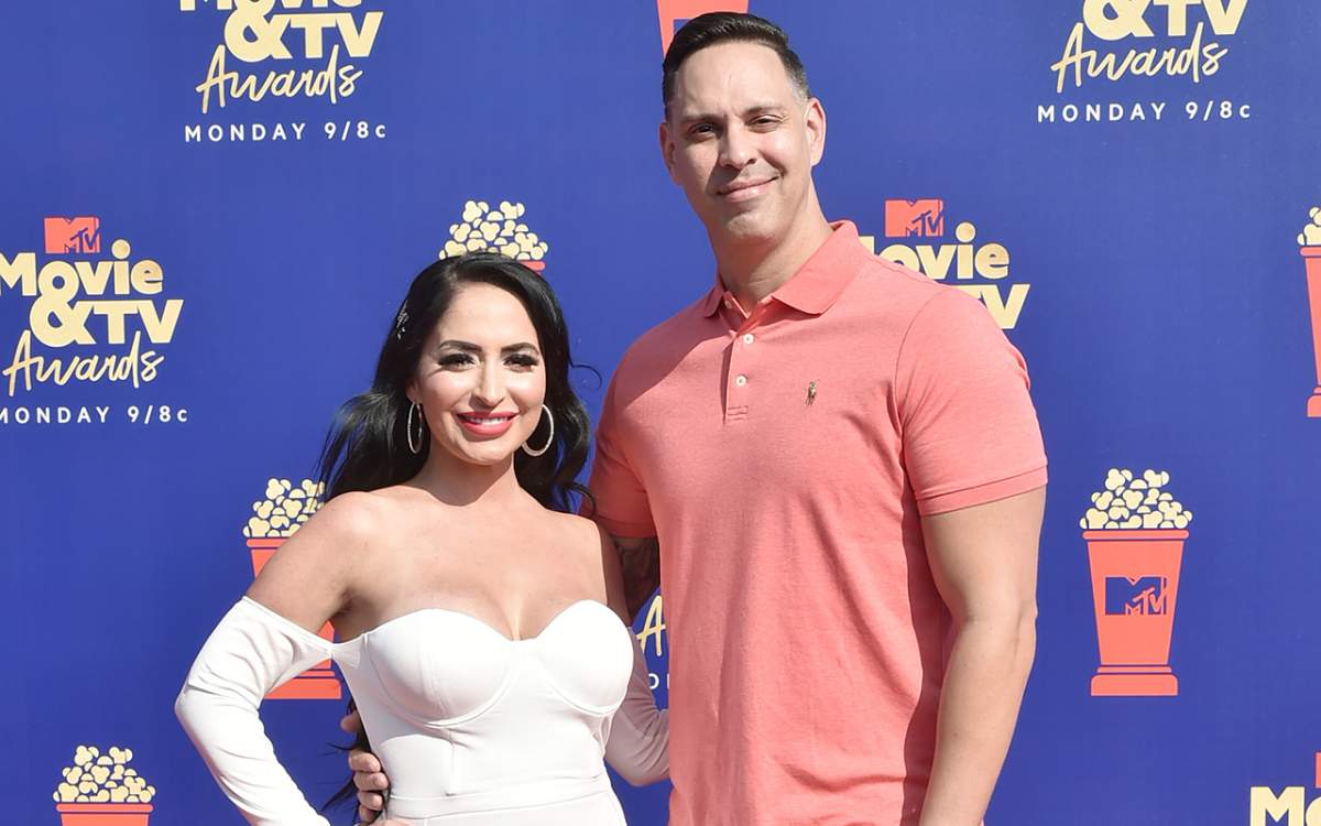 Angelina Pivarnick and Chris Larangeira attend the 2019 MTV Movie & TV Awards - Arrivals at Barker Hangar on June 15, 2019 in Santa Monica, California.