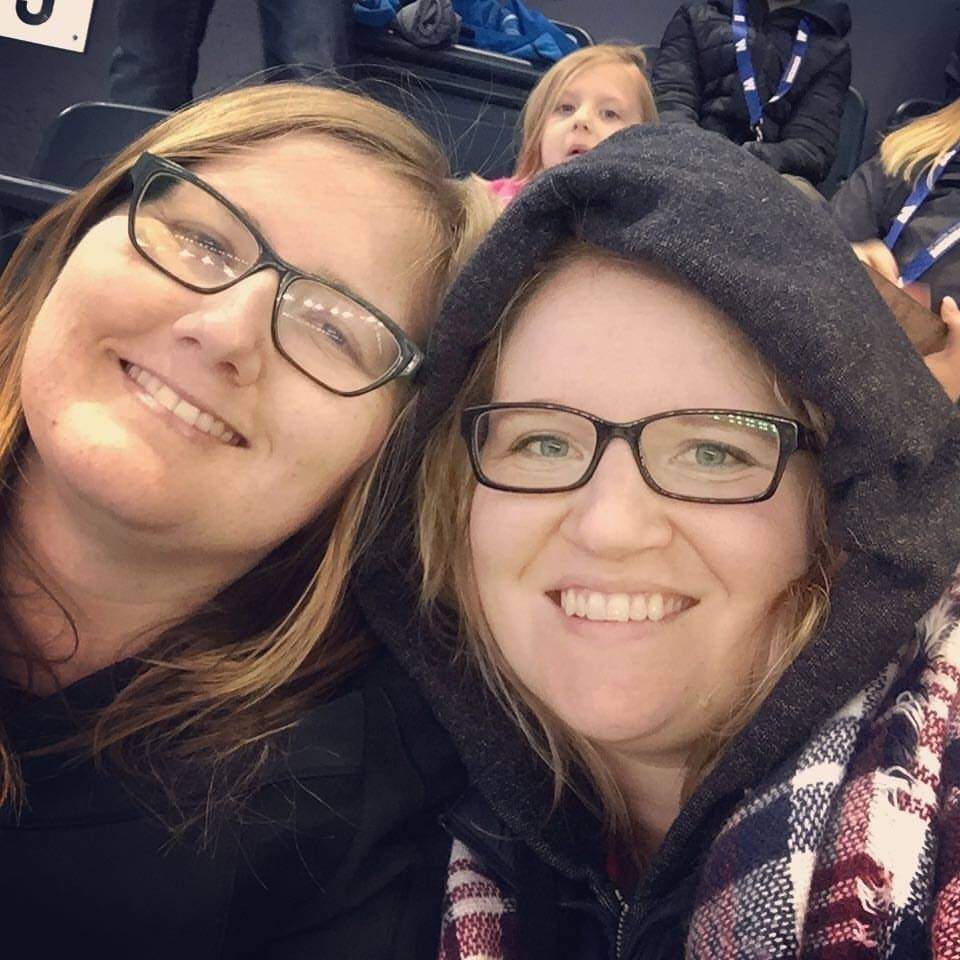 Charlene Krause (left) and her close friend Andrea Bock pose for a selfie at a Winnipeg Blue Bombers game.