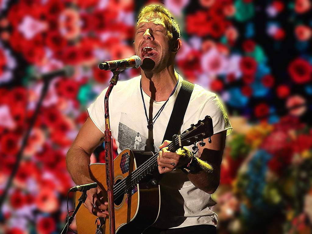 British musician Chris Martin, the vocalist of the rock band Coldplay, performs during a live appearance in the Italian TV program ‘Che tempo che fa’ in Milan, Italy, on Nov. 13, 2016.