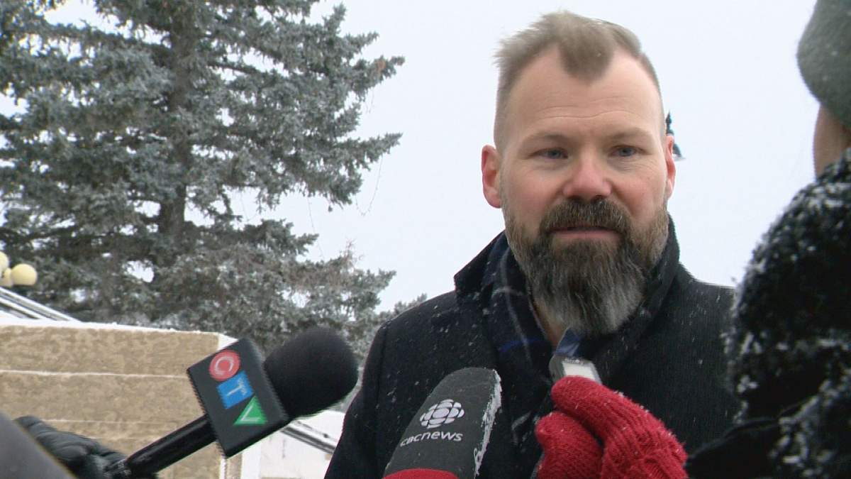 Environment Minister Dustin Duncan spoke with students at a climate rally in Regina on Nov. 29.