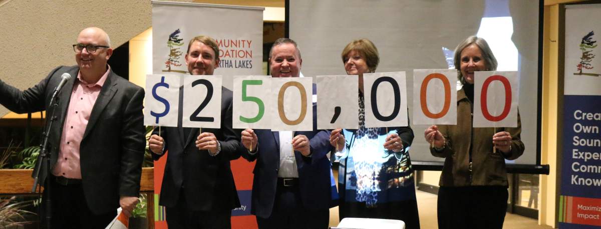 Community Foundation of Kawartha Lakes president Mike Perry, from left, vice-president Mike Belamy, secretary Jack Roks and director Tina VanderHeyden, foundation co-ordinator Marg Cunningham, celebrate the establishment of a major fund.