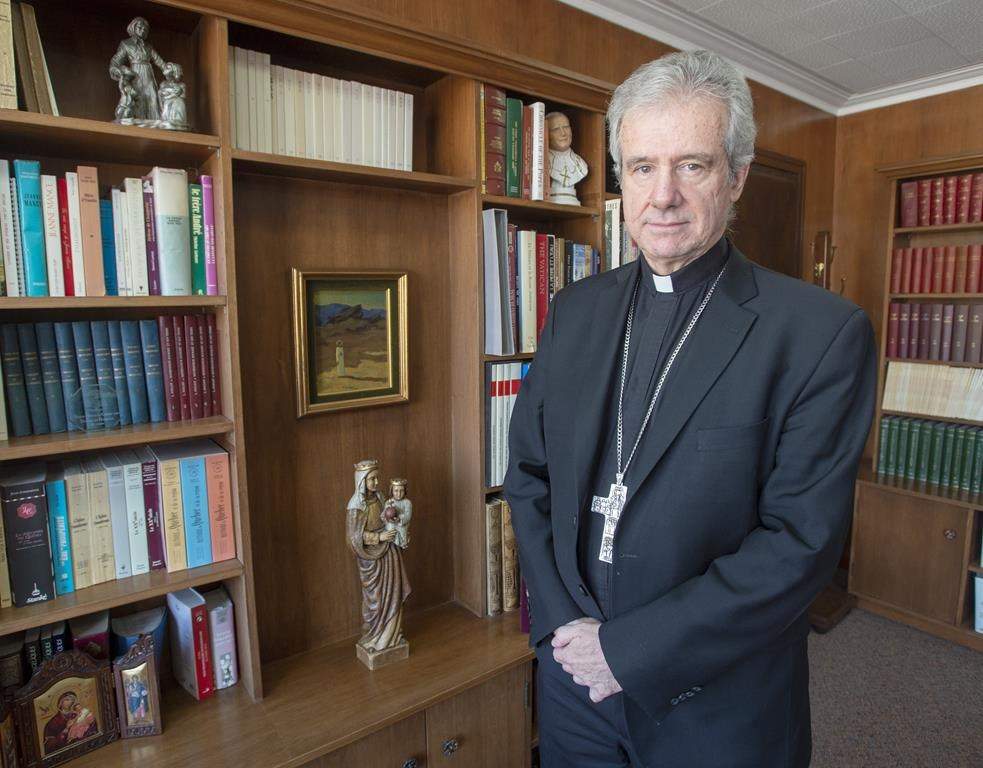 Archbishop Christian Lepine is seen in his office Wednesday, March 27, 2019 in Montreal. THE CANADIAN PRESS/Ryan Remiorz.
