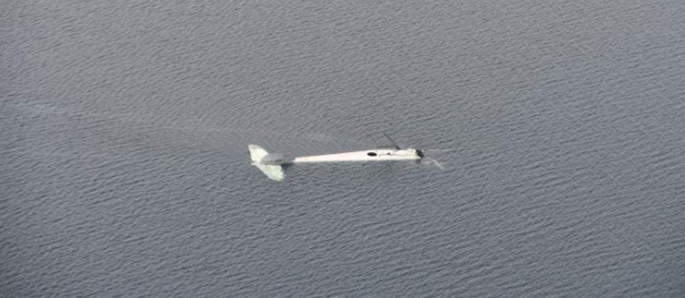 The wreckage of a float plane owned by Quebec airline Air Saguenay is shown after it crashed into a Labrador lake in this 2019 handout photo.