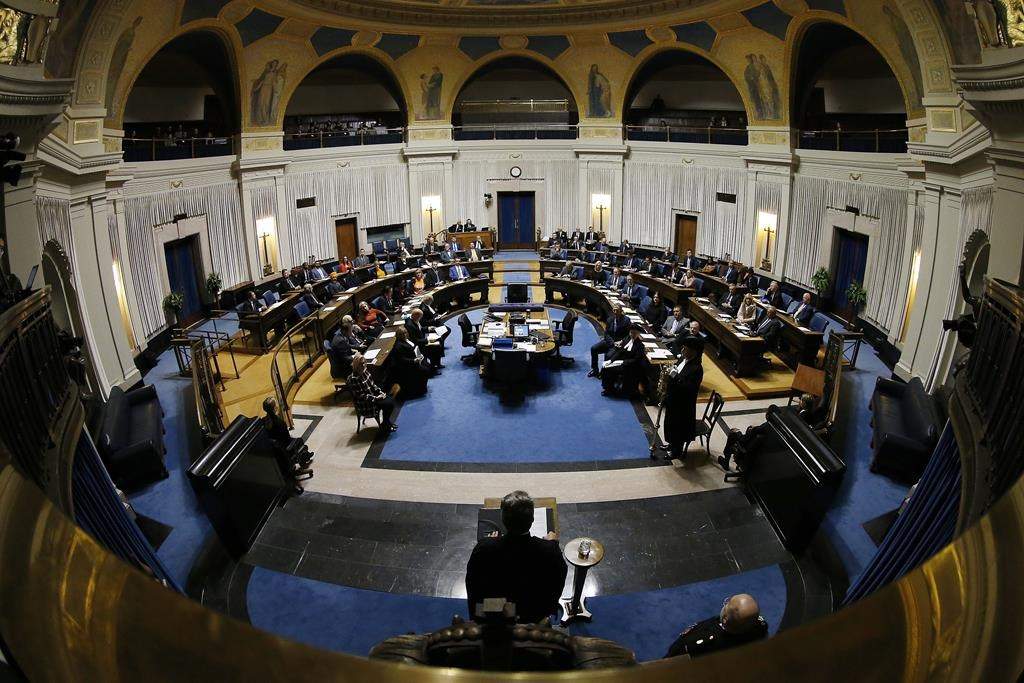 Manitoba's Progressive Conservative government says its plans to make a a 15 per cent cut in management levels to the province's public service sector.