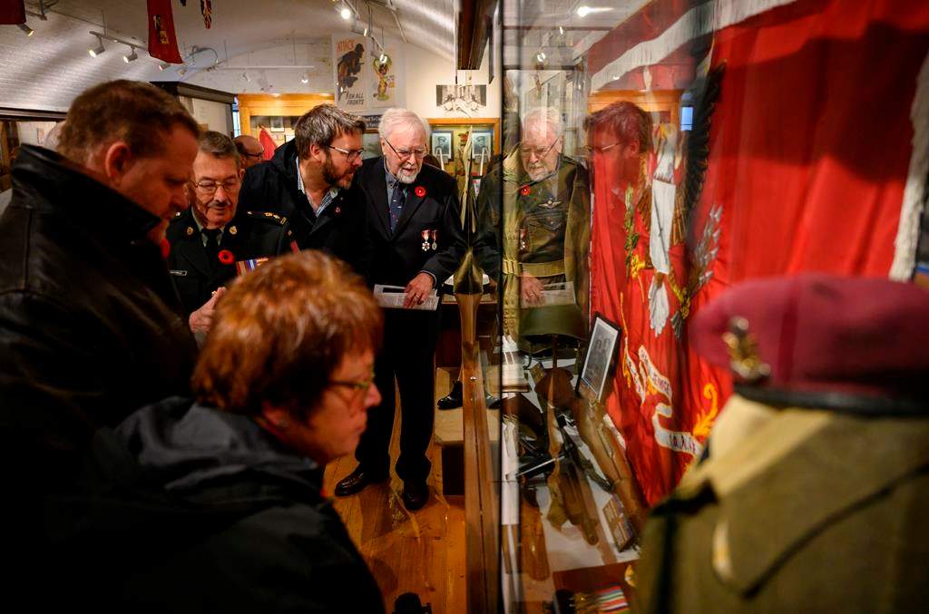 Family and friends of the late Second World War Sergeant Herb Peppard join other members of the military for the unveiling of a new First Special Service Force exhibit featuring Sergeant Peppard's memorabilia at the Army Museum Halifax Citadel in Halifax on Friday, November 8, 2019.