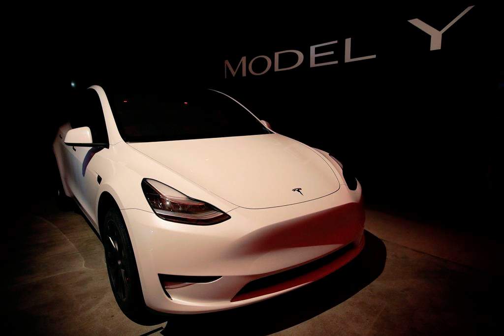 In this March 14, 2019, file photo, Tesla's Model Y is displayed at Tesla's design studio in Hawthorne, Calif.