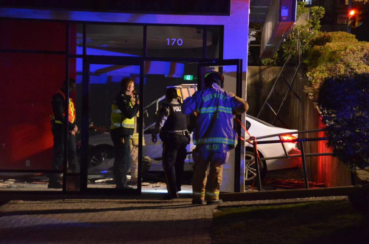 Burnaby Fire were on scene Thursday night to a car crash into a storefront
Credit: Curtis Kreklau.
