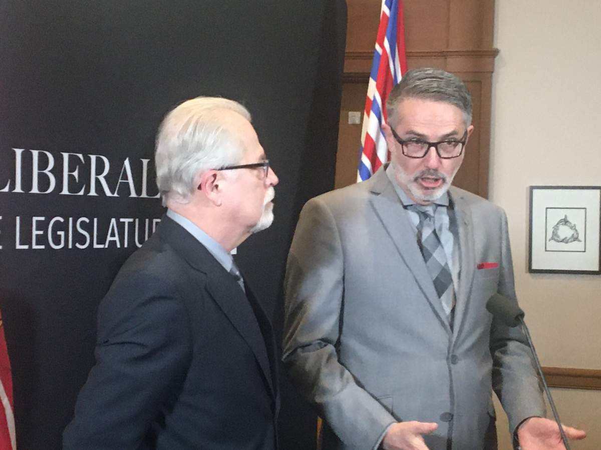 Liberal MLA Laurie Throness (right) says British Columbia should become a national leader in requiring kids to buckle up.