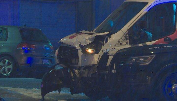 A crash at the intersection of 110A Avenue and 95 Street in Edmonton on Tuesday sent a postal worker and two police officers to hospital with minor injuries.