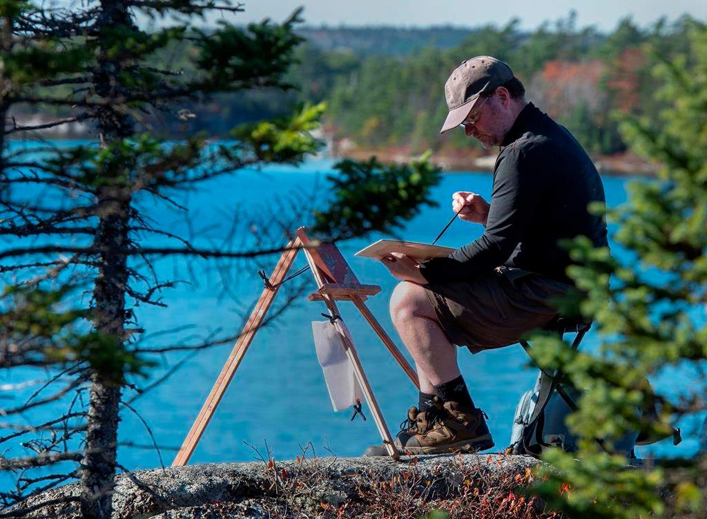 Artist Geoffrey Grantham paints overlooking Susies Lake in the Blue Mountain-Birch Cove Lakes Wilderness Area, one of the largest urban parks in the country, in Halifax on Tuesday, Oct. 29, 2019.
