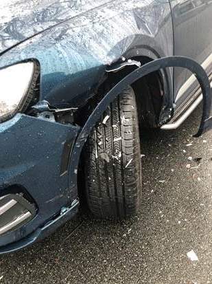 Damage to a Burnaby woman’s car from a Monday morning hit-and-run.