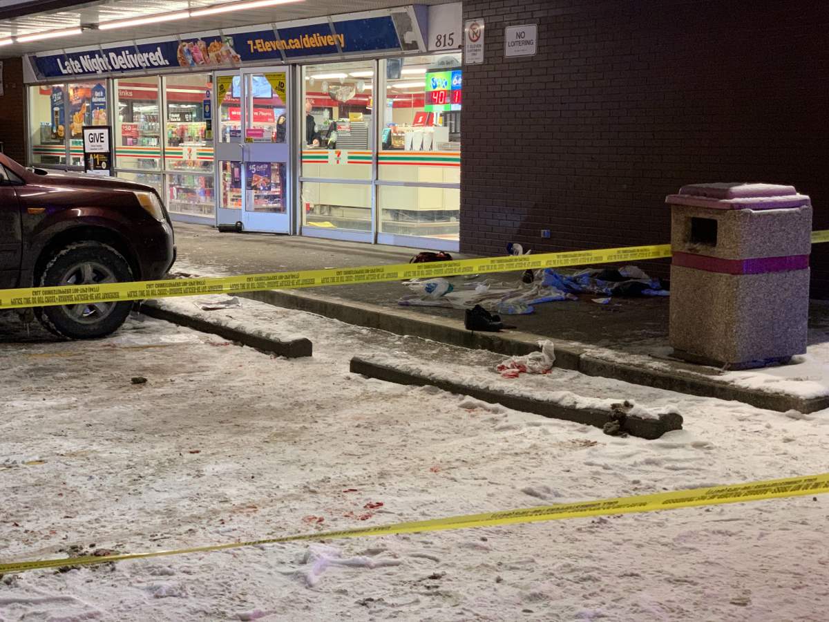 Police tape up near a 7-11 at Arlington and Ellice Avenue on Nov. 21, 2019.