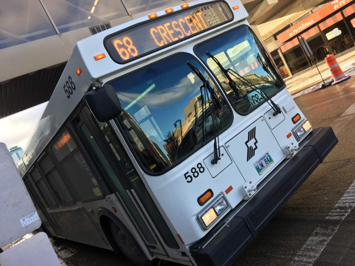 The union representing Winnipeg Transit employees is calling on the city to install enhanced protective shields around operators after a driver was forced to jump out the driver's side window of a bus when a woman with a knife allegedly attacked him Sunday.