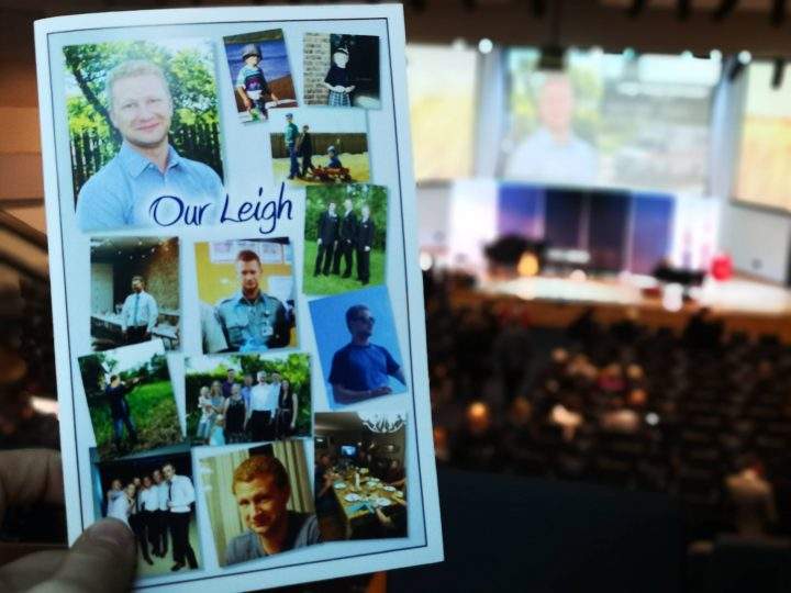 Pictures of Schroeder with friends, family and from throughout his life covered the front of the memorial service program.