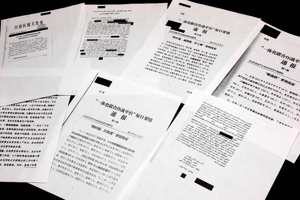 A sample of classified Chinese government documents leaked to a consortium of news organizations, is displayed for a picture in New York, Friday, Nov. 22, 2019. Beijing has detained more than a million Uighurs, ethnic Kazakhs and other Muslim minorities for what it calls voluntary job training. The confidential documents lay out the Chinese government’s deliberate strategy to lock up ethnic minorities to rewire their thoughts and even the language they speak. (AP Photo/Richard Drew)