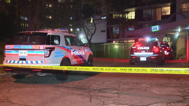 Police at the scene of the fatal shooting Saturday.