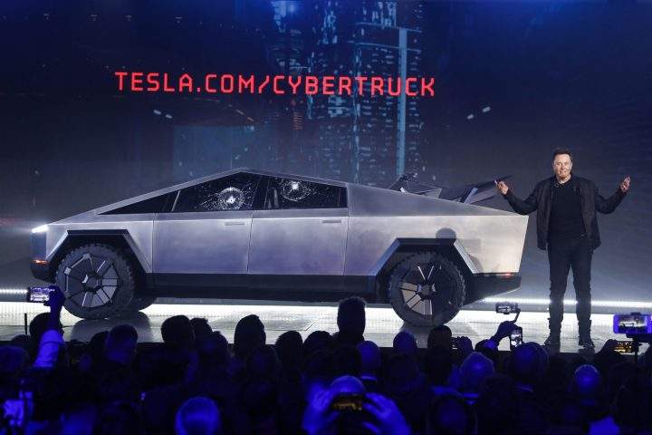 Tesla CEO Elon Musk introduces the Cybertruck at Tesla’s design studio Thursday, Nov. 21, 2019, in Hawthorne, Calif. Musk is taking on the workhorse heavy pickup truck market with his latest electric vehicle. (AP Photo/Ringo H.W. Chiu)